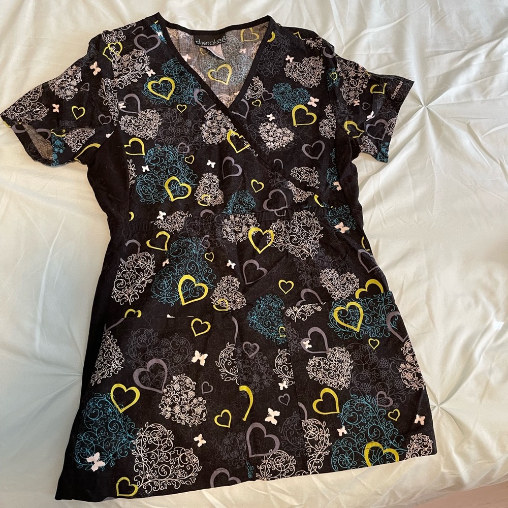 Cherokee scrub top size xsmall. Heart design